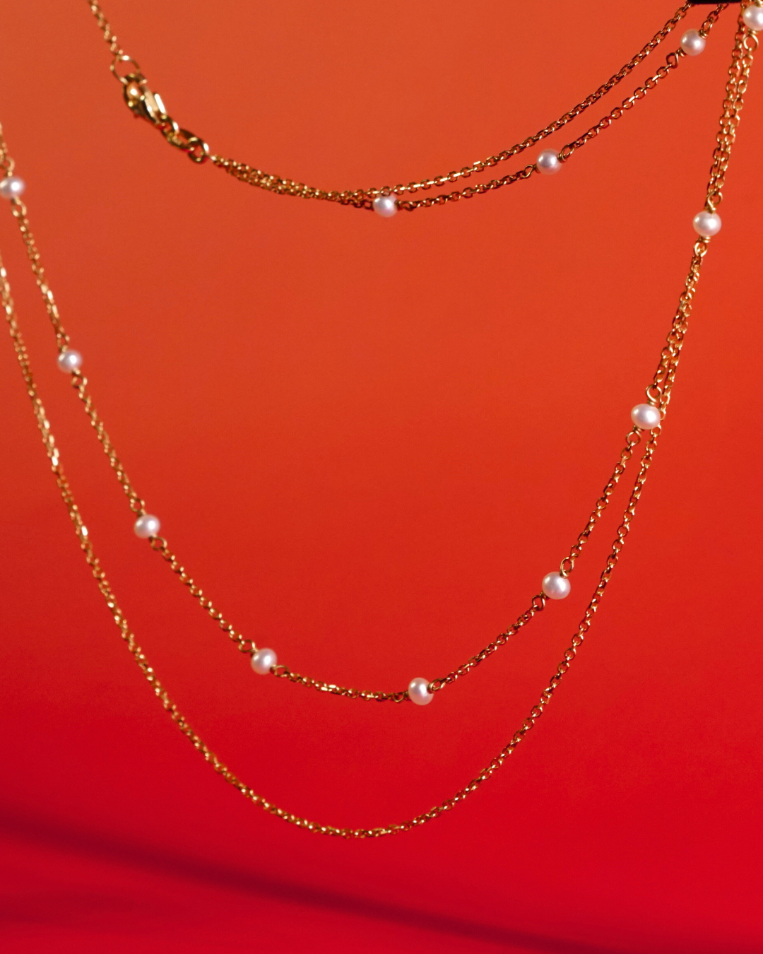 Double-chained Gold Pearl Station Necklace