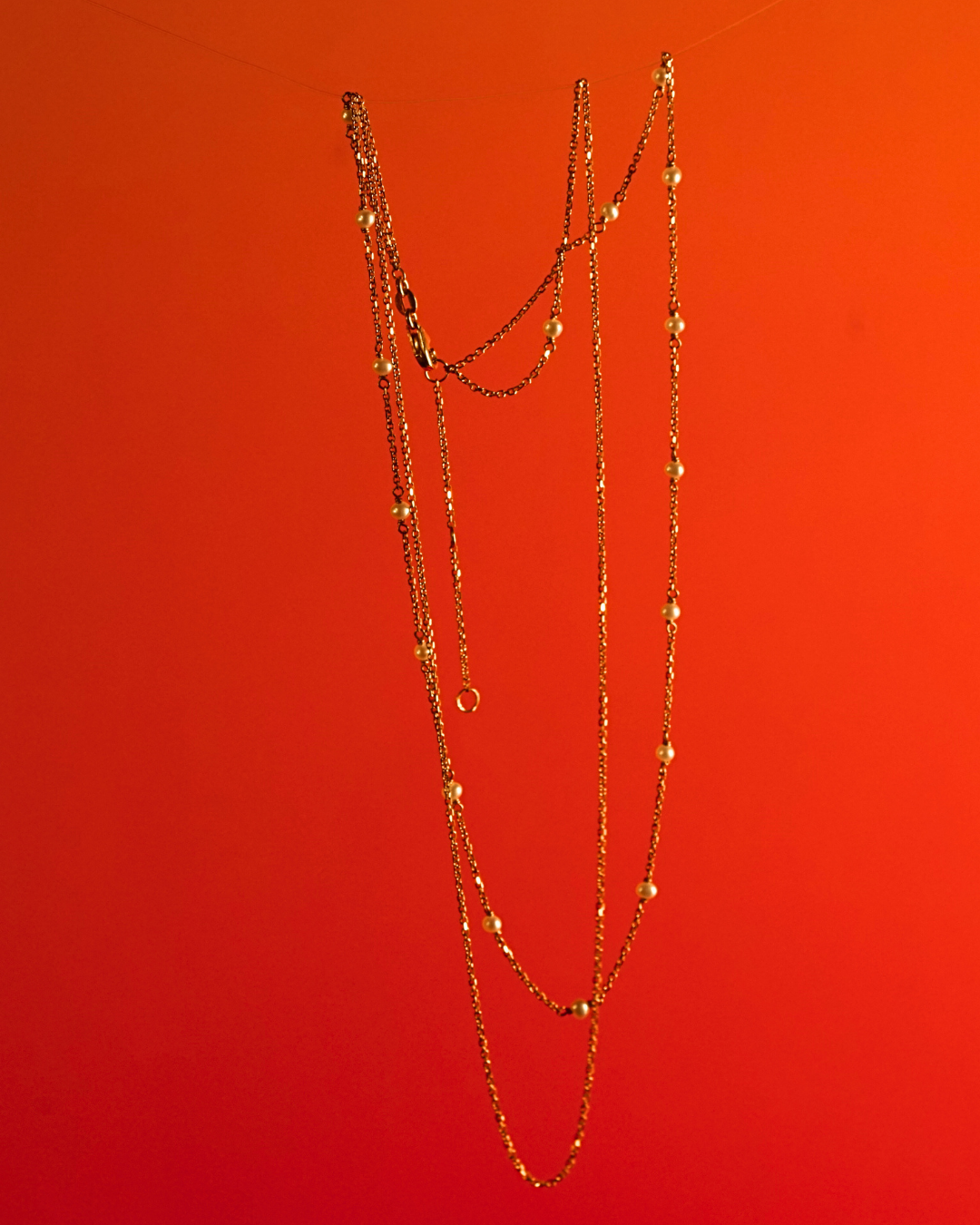 Double-chained Gold Pearl Station Necklace