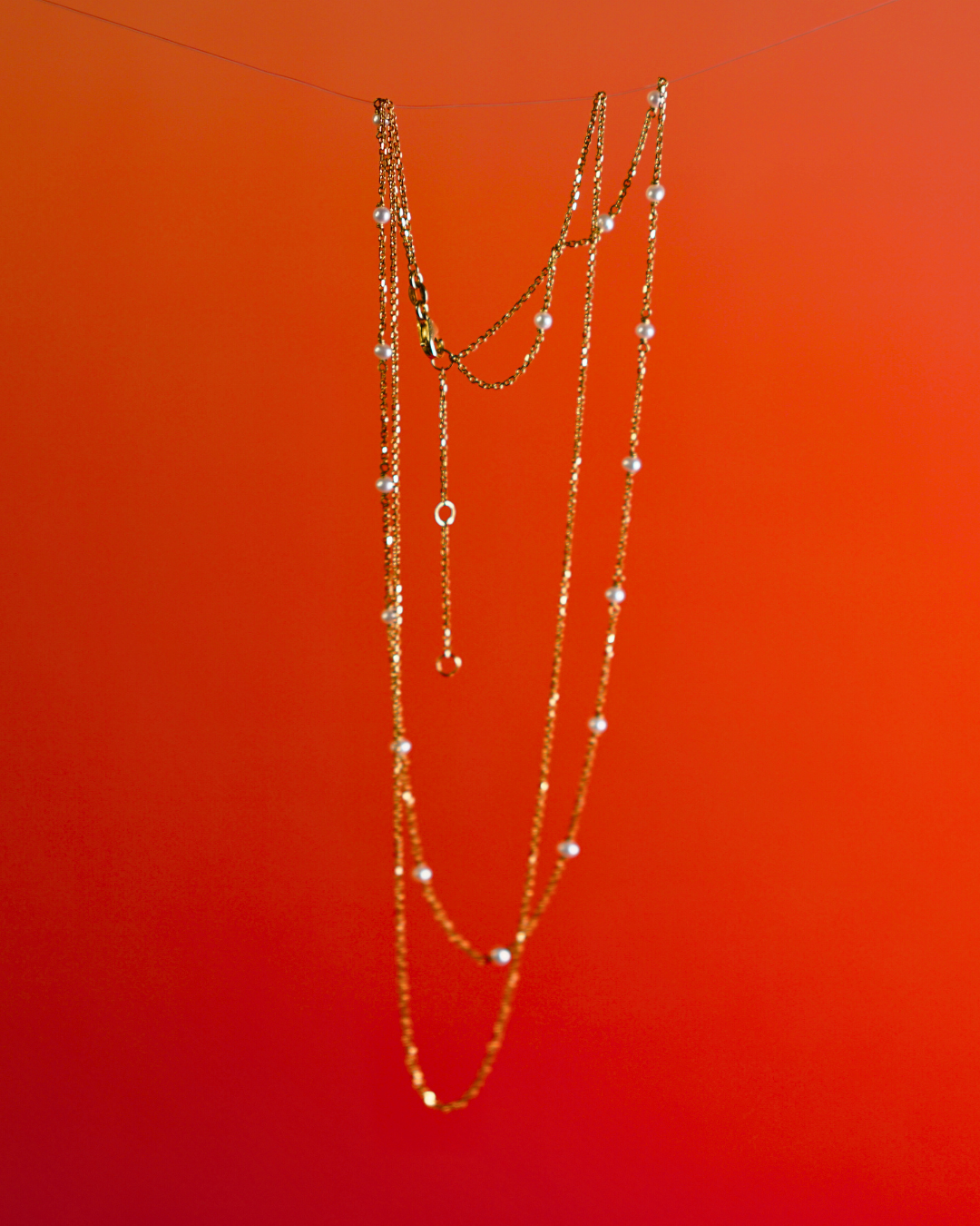 Double-chained Gold Pearl Station Necklace