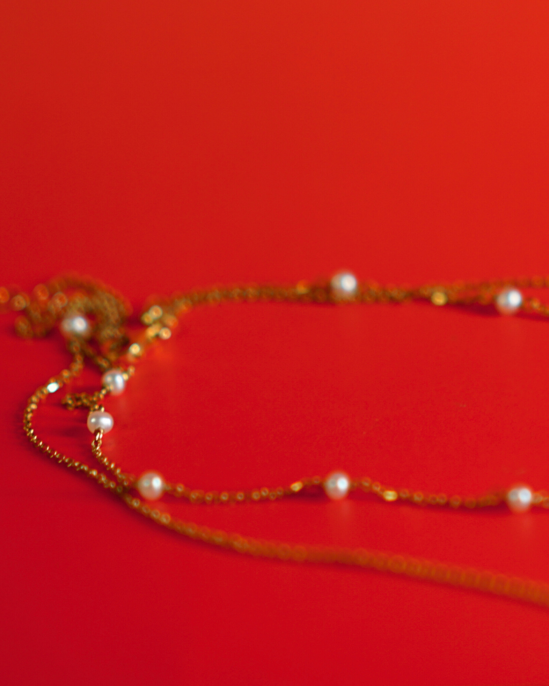 Double-chained Gold Pearl Station Necklace